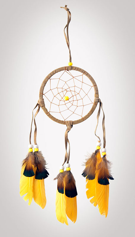 4-1/2" diameter ring wrapped in tan leather with tan leather straps and yellow feathers with brown & black tops. Adorned with yellow and white beads on a white background.
